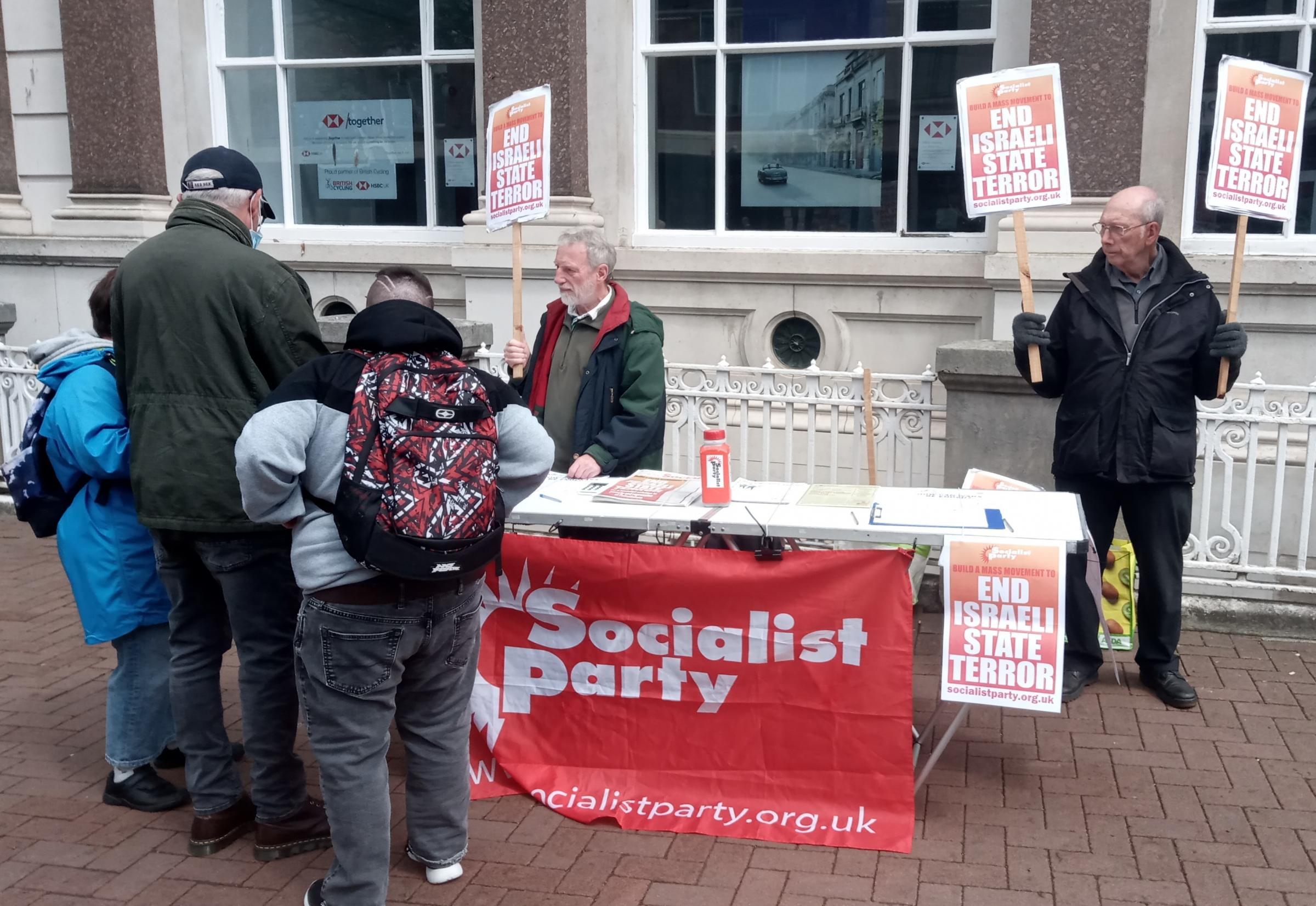 Activists from Cumbria Socialist Party campaign for an end to violence against Palestine in Carlisle 